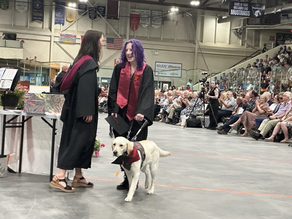 2026 Grad and her trusted Guide Dog